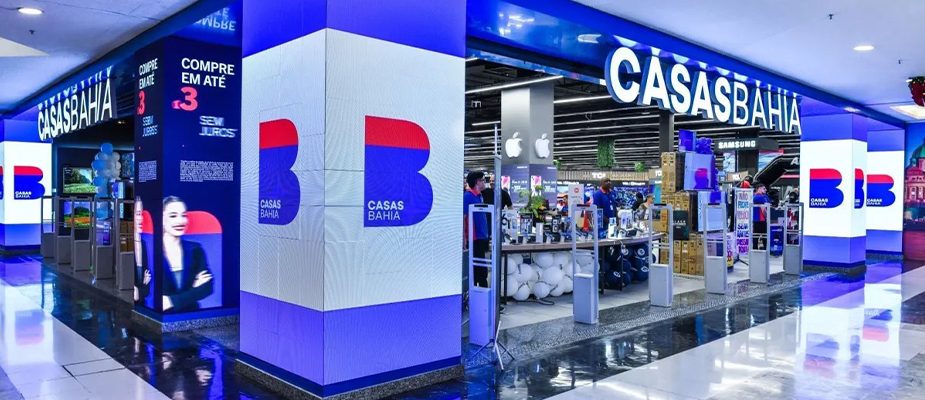 Imagem destaque: Casas Bahia enfrenta suspensão de demissões pela Justiça e ações de despejo