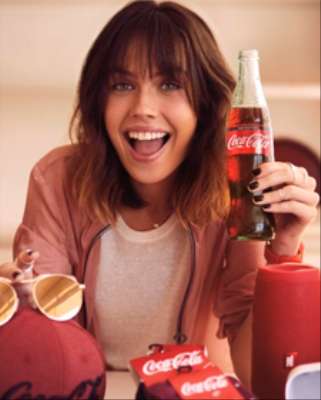 Imagem: Consumidor de Coca-Cola Vira Influenciador